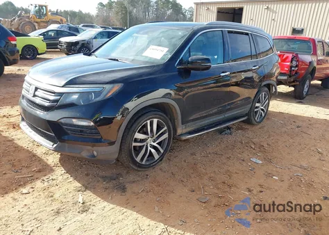 2017 Honda Pilot Touring z USA, uszkodzony, nr VIN 5FNYF6H94HB036908